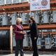 Vice President Kamala Harris speaks with Sen. Maggie Hassan (D-NH)(L) during a listening session on broadband internet at the New Hampshire Electric Co-op in Plymouth, N.H., April 23, 2021, as she travels to the state to promote the administration’s economic plans.